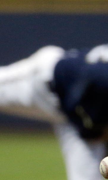 Brewers surge past Nationals late